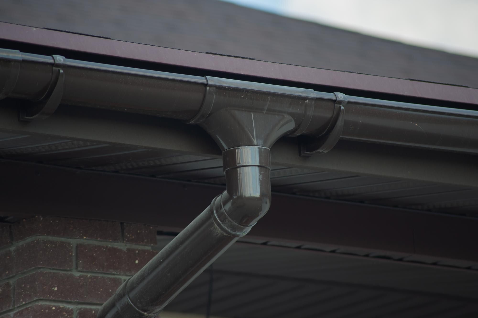 Home before seamless gutter installation in Rio Rancho